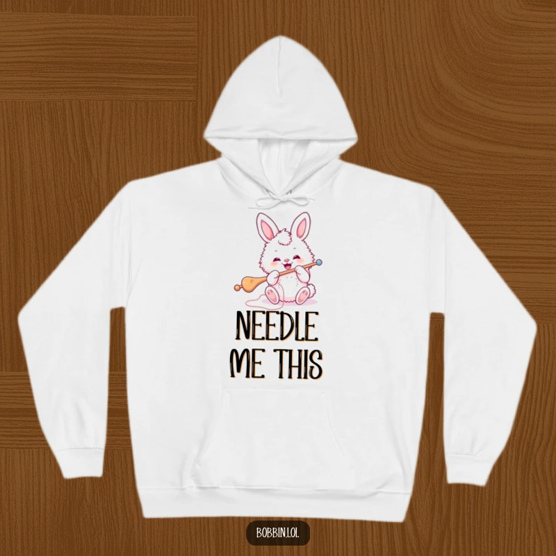 Funny Bunny Sewing Hoodie: A fluffy bunny enthusiastically threading a large sewing needle, great for chilly days. Perfect funny gift.