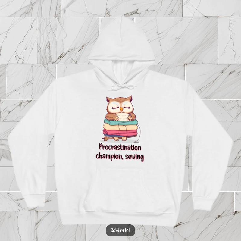 Funny sleepy owl hoodie, depicting a tired owl sewing fabric, a warm and humorous gift.