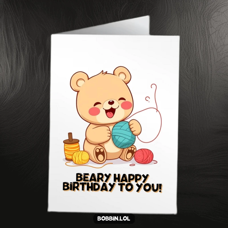 Funny Free Printable Birthday Card: A cheerful bear giggles gleefully while colorful thread rolls spill around it, sewing fun.