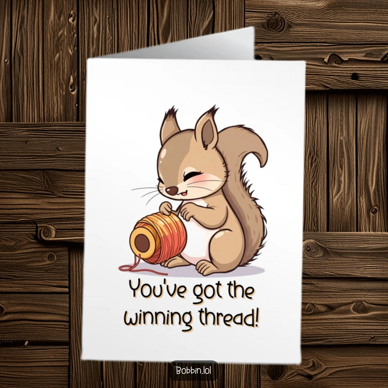 Funny Free Printable Congratulations Card showing a curious squirrel showing great interest in a vibrant spool of thread.